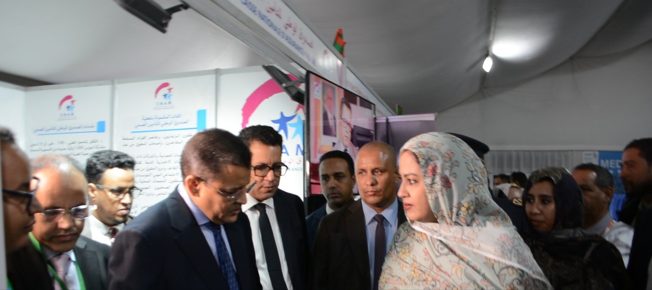السيدة الأولى تزور جناح الصندوق الوطني للتأمين ضد المرض في معرض ميديكس 2024-2 الدولي للصحة